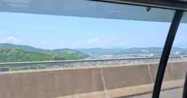 Highway Running Car Window Crash Barrier Hiding Town Mountain View — Stock Video