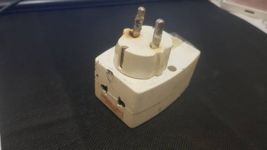 Burnout electrical appliances or electrical plug or electrical adapter dangerous appliances to cause fire hazard