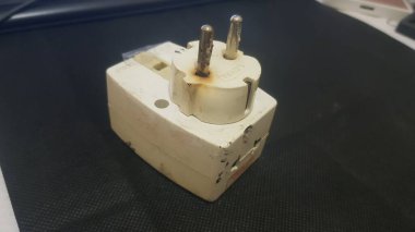 Burnout electrical appliances or electrical plug or electrical adapter dangerous appliances to cause fire hazard