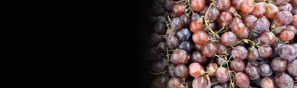 Close up of raw organic sweet red grapes background, wine grapes texture, Healthy fruits Red wine grapes background, top view fresh local produce, good for your multimedia content creation