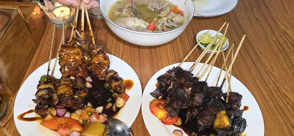 Stock image grilled mutton or lamb satay, or local Indonesian called Sate Kambing or known as Mutton meat Satay cooked in traditional stove, good for digital recipe content creation