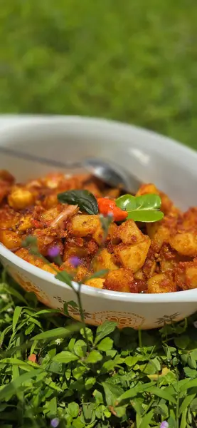 stock image Delicious stir fried chili potatoes, famous indonesian homemade cooking called kentang balado, spicy and tasty street food good for cooking and cook book recipe content creation