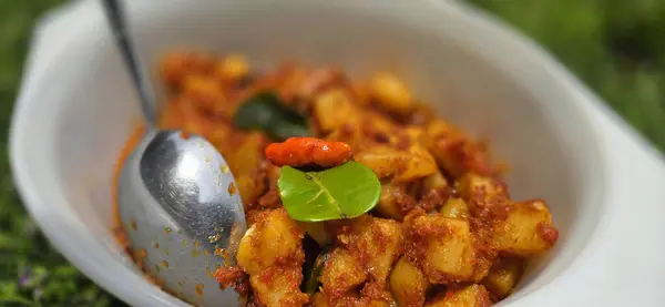 stock image Delicious stir fried chili potatoes, famous indonesian homemade cooking called kentang balado, spicy and tasty street food good for cooking and cook book recipe content creation