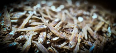 salted sun dried fishes or locals called as ikan asin, one of ancient methods to preserve fish for human consumption, a traditional comfort food in Indonesian Cuisine clipart