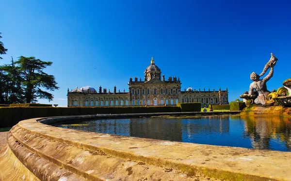 stock image beautiful and enchanting old and ancient building in rural Europe left untouched in green landscape and blue sky, medieval castle landscape good for multimedia content creation, THIS IS NOT AI Please Check EXIF DATA