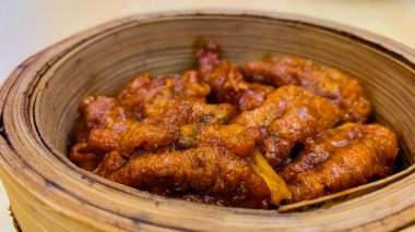 fung zau or chicken feet angsio, Fung zau is a dim sum made from chicken feet that are seasoned and steamed, the seasoning used is usually oyster sauce delicious chinese food clipart