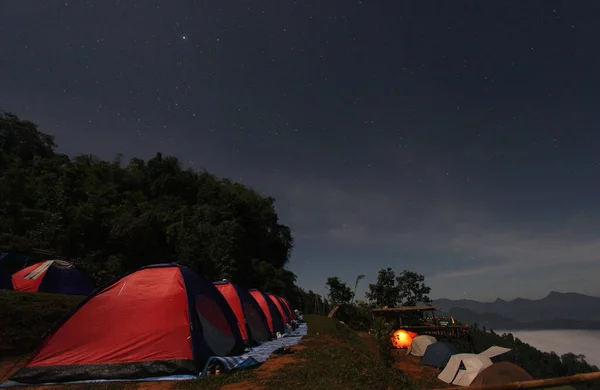 Camping on mountain with star in the sky