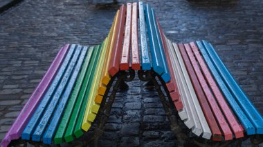 LGBT and Trans flags on urban benches clipart