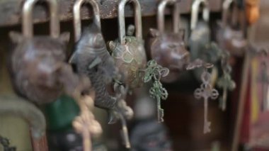 Jakarta, Indonesia-January 20, 2023: selective focus vintage animal-shaped padlock made of iron