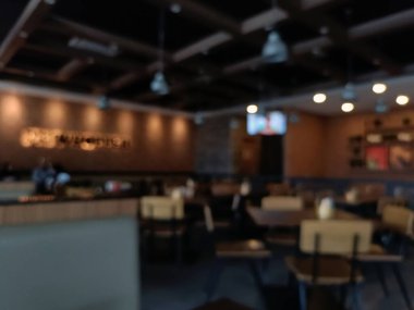 Arka plan kullanımı için kafenin ve restoran içinin bulanık görüntüsü.