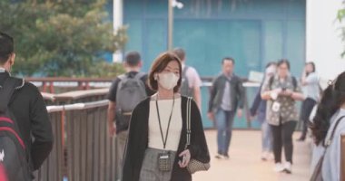 Crowd of workers heading to public transportation in the afternoon in Jakarta, Indonesia August 20, 2025