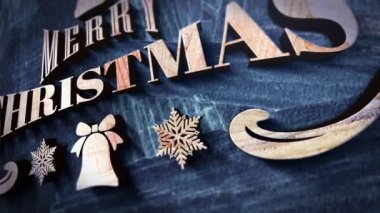 Ahşap desenli, sinematik başlıklı Mutlu Noeller krom metninin 3 boyutlu animasyonu. Karavan kış karı, Noel ve Yeni Yıl etkinliği arka planı için son kapak