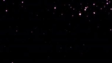 Güzel döngü soyut düşen parlak pembe yıldız parçacıkları siyah zemin üzerinde hareket ışığı. 4K kusursuz döngü kar yağışı kış ışıltısı parçacıkları Kış Noel etkinliği için temalı arka plan 