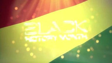 Black History Month golden text word with flag waving in wind texture and top optical lens flare light and glow bokeh cinematic title abstract background 