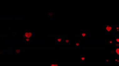 Soyut döngüler siyah zemin üzerinde kırmızı kalp parçacıkları yukarı doğru akar. Sevgililer Günü için animasyon, doğum günü partisi, düğün ya da herhangi bir tatil için. Romantik animasyon için arka plan.