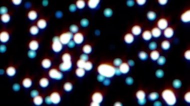 Mavi kıvrımlı bulanık baloncuk parçacıkları siyah soyut arkaplanda yüzüyor. 4K 3D kusursuz döngü animasyonu. Kış tatili konsepti, Mutlu Noeller, yeni yıl, düğün, kutlama