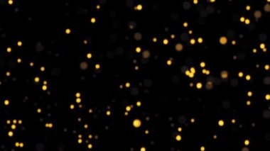 Güzel daire şeklinde parlayan parlak turuncu bokeh parçacıkları siyah arkaplanda canlandırıyor. Kış Noel 'i için yeni yıl temalı 4K kusursuz döngü