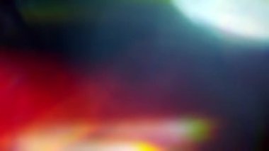 Proje ekranı kaplaması için soyut renkli optik ışık sızıntısı hareket arkaplanı döngüsü. Yaratıcı, gizemli ışık sızıntısı elementi için animasyon kavramı