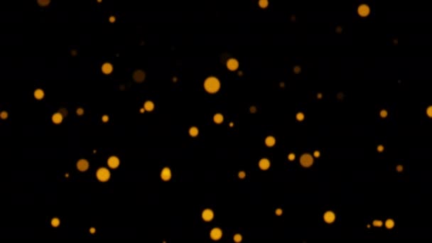 Işıldayan Turuncu Bokeh Parçacıklarının Döngü Hareketlerinin Grafikleri Siyah Soyut Arkaplanda — Stok video