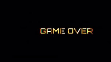 Game Over altın ışıklı hareket metni üzerinde siyah soyut arkaplan üzerinde hata etkisi olan bir döngü. Reklam konseptini tanıt QuickTime Alpha Channel 444 'ü kullanarak izole et