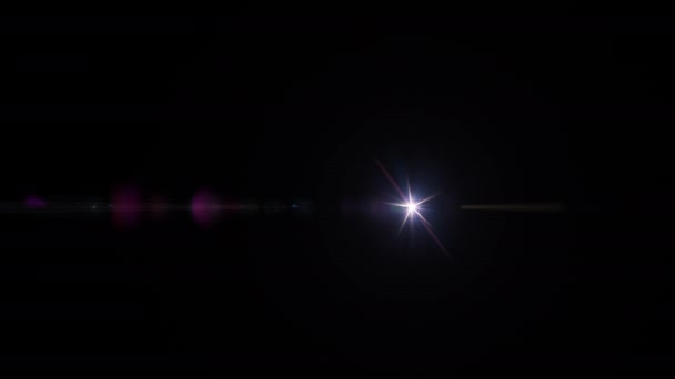 抽象ループグロー多色星光学レンズフレアは スクリーンプロジェクトオーバーレイのための黒い背景上の光回転アニメーションを輝かせます — ストック動画