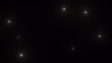 Soyut yanıp sönen altın parıldayan, yanıp sönen optik mercek animasyon fotoğrafçısı kamera flaşları arka plan. 4K kusursuz döngü dinamik kinetik parlak yıldız ışığı