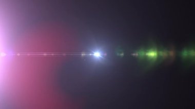 Soyut döngü merkezi renkli yıldız optik mercek parlamaları, ekran projesi için siyah arkaplan üzerinde ışık patlaması animasyonu parlatır. 4K dinamik kinetik parlak yıldız ışığı etkisi. 