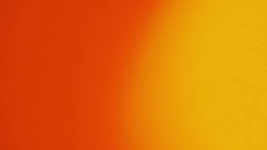 Soyut arka plan turuncu ışık sızıntısı. 4K güzel turuncu animasyon grafiği parlak dalgalı ışıklar soyut arkaplan akışı  