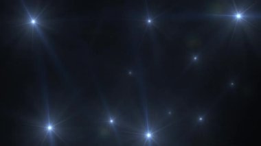 Soyut döngü yanıp sönen mavi yanıp sönen optik lens animasyon fotoğrafçı kamera flaşları arka plan. 4K kusursuz döngü dinamik kinetik parlak yıldız ışığı