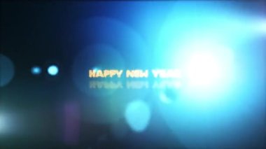 Yeni yılınız kutlu olsun. Parlak sarı neon lazer metin animasyon efekti. Siyah soyut arkaplan üzerinde ışık saçan partiküller olacak..
