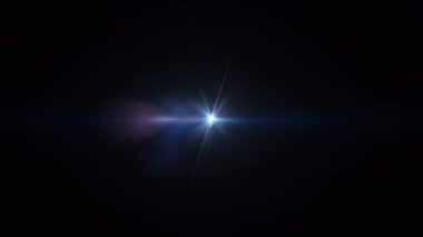 Soyut döngü merkezi yanıp sönen golw yıldızı mavi optik lens siyah arka planda parlıyor. Aydınlatma lambası etkisi dinamik parlak.