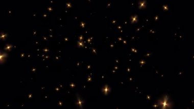 Göz kırpan parlak altın yıldız parçacıkları siyah soyut arka planda hareket ediyor. Alfa kanalı Quicktime Prores 444 ile izole edilmiş Mutlu Noeller, Yeni Yıl, Düğün,, 