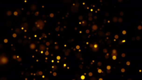 抽象的环路动画闪烁着金黄泡泡粒子在黑色背景上飞行的光芒 3D无缝环路橙色红色金黄微粒飞扬在空中 — 图库视频影像