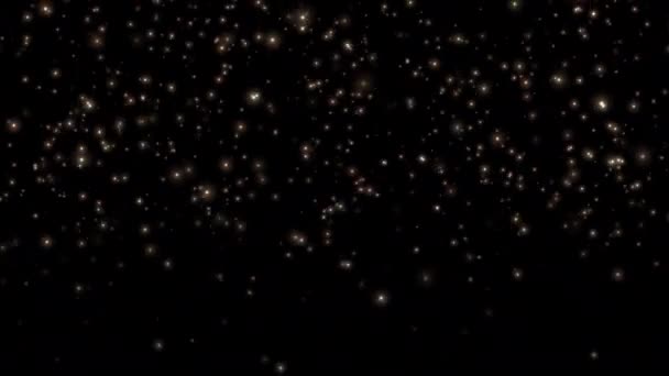 美丽的环状抽象下落闪烁着闪光的金粒子动画光芒在黑色抽象的背景上 4K无缝回旋降雪冬季闪光粒子为冬季圣诞主题背景甚至于 — 图库视频影像