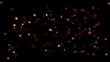 Soyut döngü animasyonu yanıp sönen parlak altın renkli balon parçacıkları siyah arkaplanda uçuyor. 4K 3D kusursuz turuncu kırmızı altın parçacıkları havada uçuşuyor..