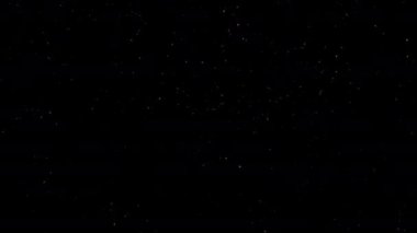 Güzel döngü, soyut düşüşler parıldayan beyaz toz parçacıkları siyah soyut arkaplanda canlanıyor. 4K dikişsiz döngü kar yağışı kış ışıltısı parçacıkları temalı kış arkaplanı 