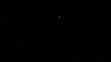 Soyut döngü animasyonu siyah arkaplanda pembe yıldız toz parçacıkları parlıyor. 4K 3D kusursuz turuncu altın parçacıkları havada uçuşuyor..