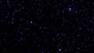 Mor parlak mor yıldız parçacıkları siyah soyut arkaplanda akar. Alevli, mor, parlayan, yanan kül parçacıklarının animasyonu.