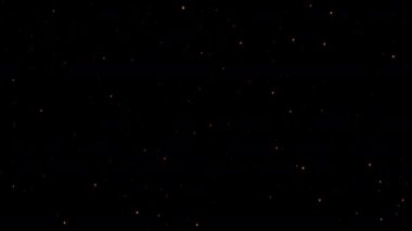 Soyut döngü animasyonu turuncu yıldızların ışıltısı toz parçacıkları siyah arkaplanda akar. Kusursuz turuncu bokeh parçacıkları havada uçuşuyor.. 