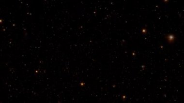 Siyah soyut arkaplan üzerinde düşen güzel altın yıldız parçacıkları animasyonu.