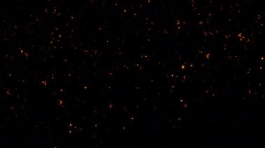 Soyut animasyon döngüsü yüzen parlak altın yıldızların toz parçacıkları siyah arkaplanın üzerine doğru akar. 4K 3D kusursuz altın halkalı bokeh parçacıkları havada uçuşuyor..