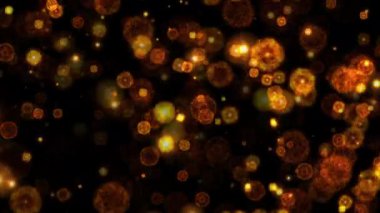 Turuncu kıvılcım kıvılcımlı patlayıcı parçacıklar siyah soyut arka planda ateş animasyonunun etrafında dönerler. 4K 3D ateşli turuncu parlayan kor yanan kül parçacıklarının animasyonu. 