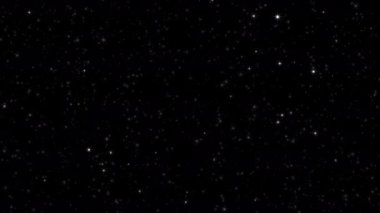 Siyah soyut arkaplan üzerinde titreşen beyaz yıldız parçacıkları animasyonu.