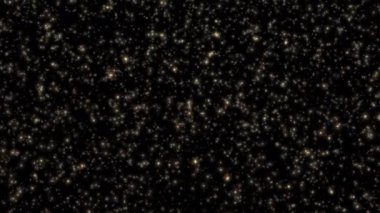 Düşen güzel döngü, titreyen altın yıldız parçacıkları siyah soyut arkaplan üzerinde animasyon.