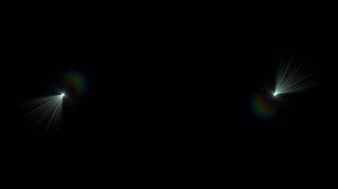 Soyut titreşen yeşil yıldız optik mercekleri siyah arkaplan üzerinde hafif animasyon hareketini parlatmaktadır. 
