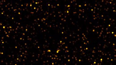 Soyut döngü animasyonu yanıp sönen parlak turuncu bokeh baloncuk parçacıkları ekran projesi için siyah zemin üzerinde uçuyor. 4K 3D kusursuz turuncu altın parçacıkları havada uçuşuyor..