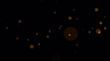 Soyut animasyon döngüsü turuncu altın bokeh parçacıkları siyah arkaplanda akıyor. 4K 3D kusursuz altın sarısı turuncu bokeh parçacıkları havada uçuşuyor.. 