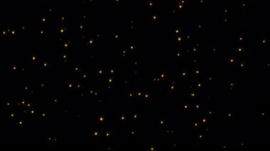 Döngü titreşen altın tozlu yıldız parçacıkları siyah soyut arkaplan üzerinde hareket akışına sahiptir. Siyah arkaplan hareketindeki altın yıldız parçacığı sinematik başlıklar