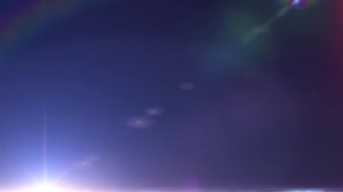 Soyut döngü mor optik parlaklık alttan soldan sağa hareket eden yanıp sönen ışık siyah arkaplanda. 4K kusursuz döngü dinamik kinetik parlak yıldız ışığı etkisi. 