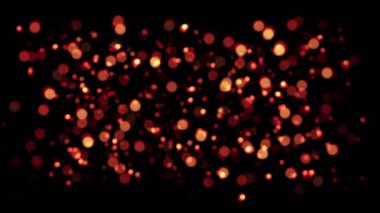 Soyut turuncu parlak kırmızı bokeh parçacıkları siyah arkaplanda akış hareketini döngüye sokun. 4K 3D ateşli kırmızı turuncu parlak uçan bokeh kül parçacıklarının animasyonu.